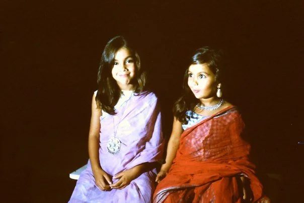 Nina Midtgaard and her sister Anita as children, wearing saris in India in the mid 1960s.